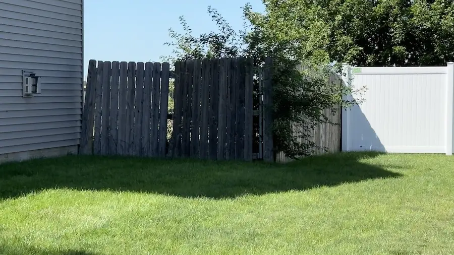 Example of missing and damaged fence panels
